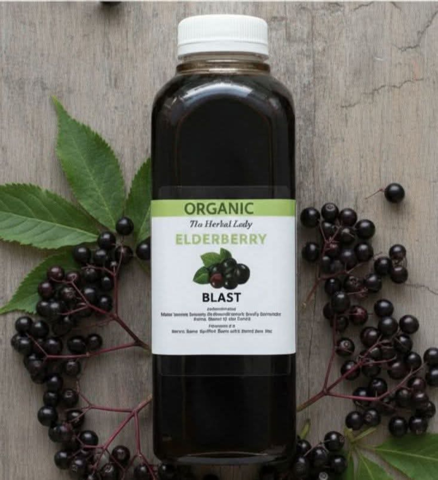 The Herbal Lady Elderberry Blast bottle with a white cap, surrounded by elderberries and green leaves.